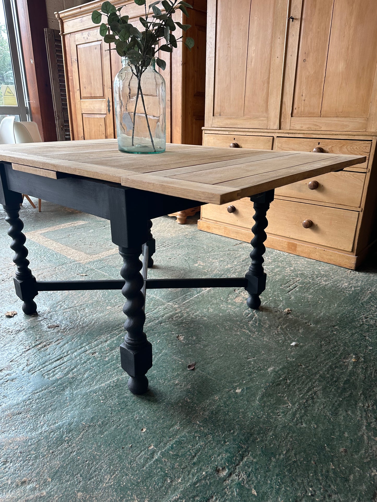 Rustic oak barley twist draw leaf table