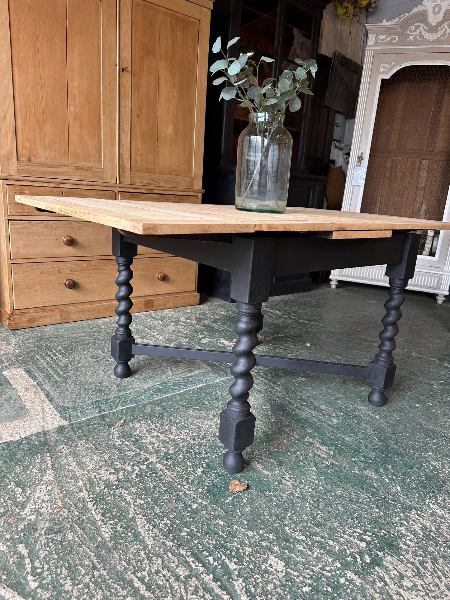Rustic oak barley twist draw leaf table