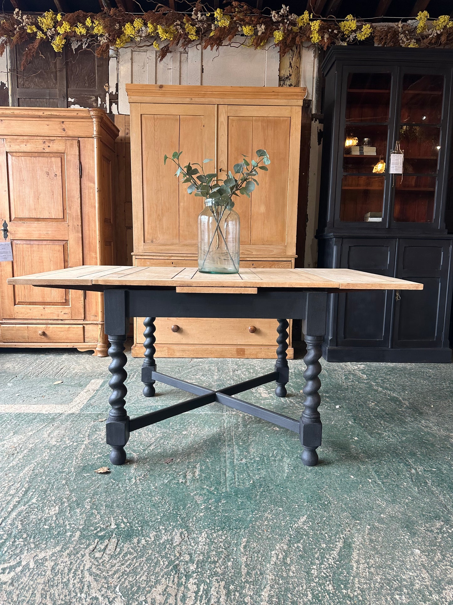 Rustic oak barley twist draw leaf table