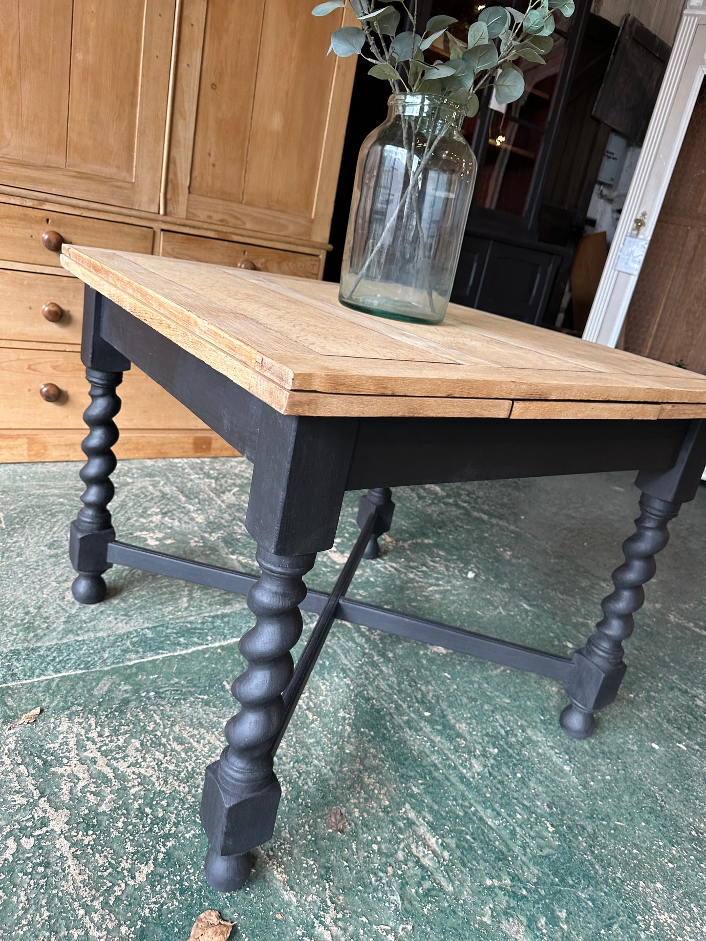 Rustic oak barley twist draw leaf table