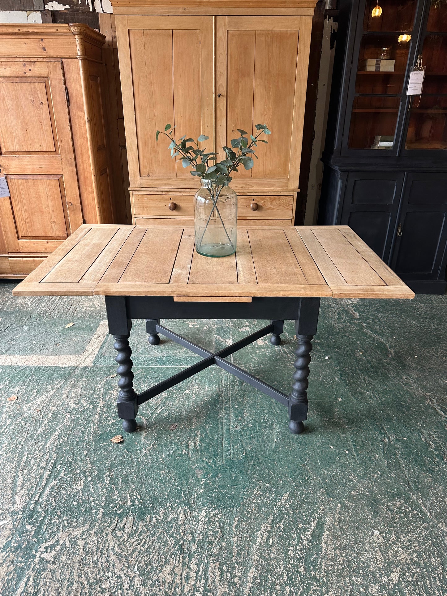 Rustic oak barley twist draw leaf table