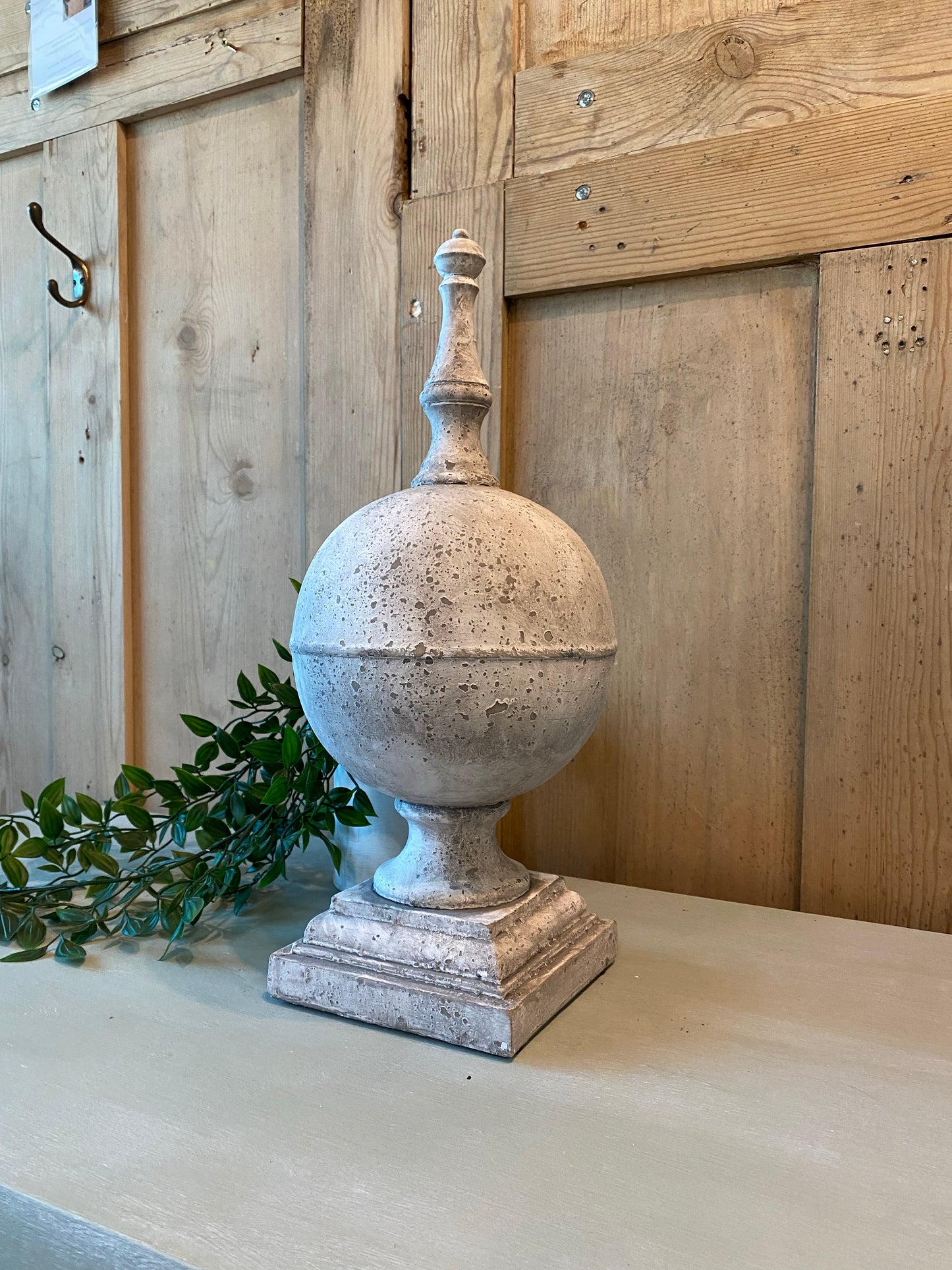 Rounded stone finial