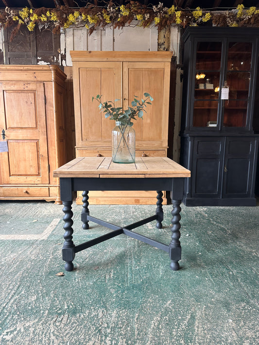 Rustic oak barley twist draw leaf table