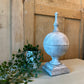 Rounded stone finial
